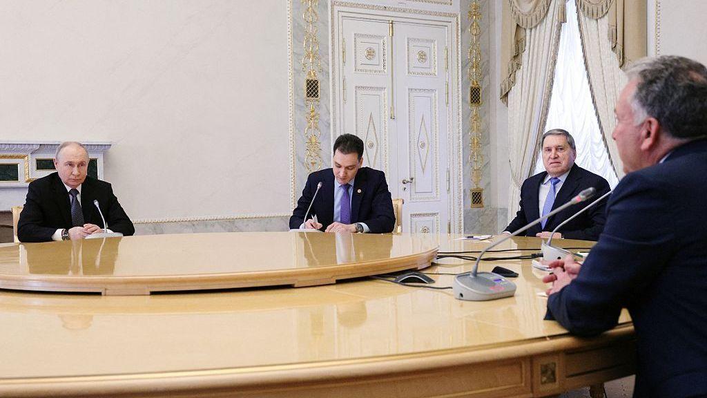 Vladimir Putin at a meeting with Ukrainian President Volodymyr Zelensky