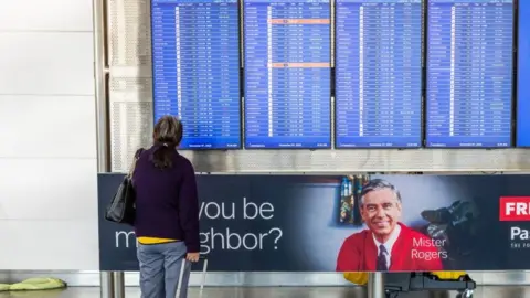 US Transportation Chief Forecasts Severe Flight Reductions Amid Government Shutdown