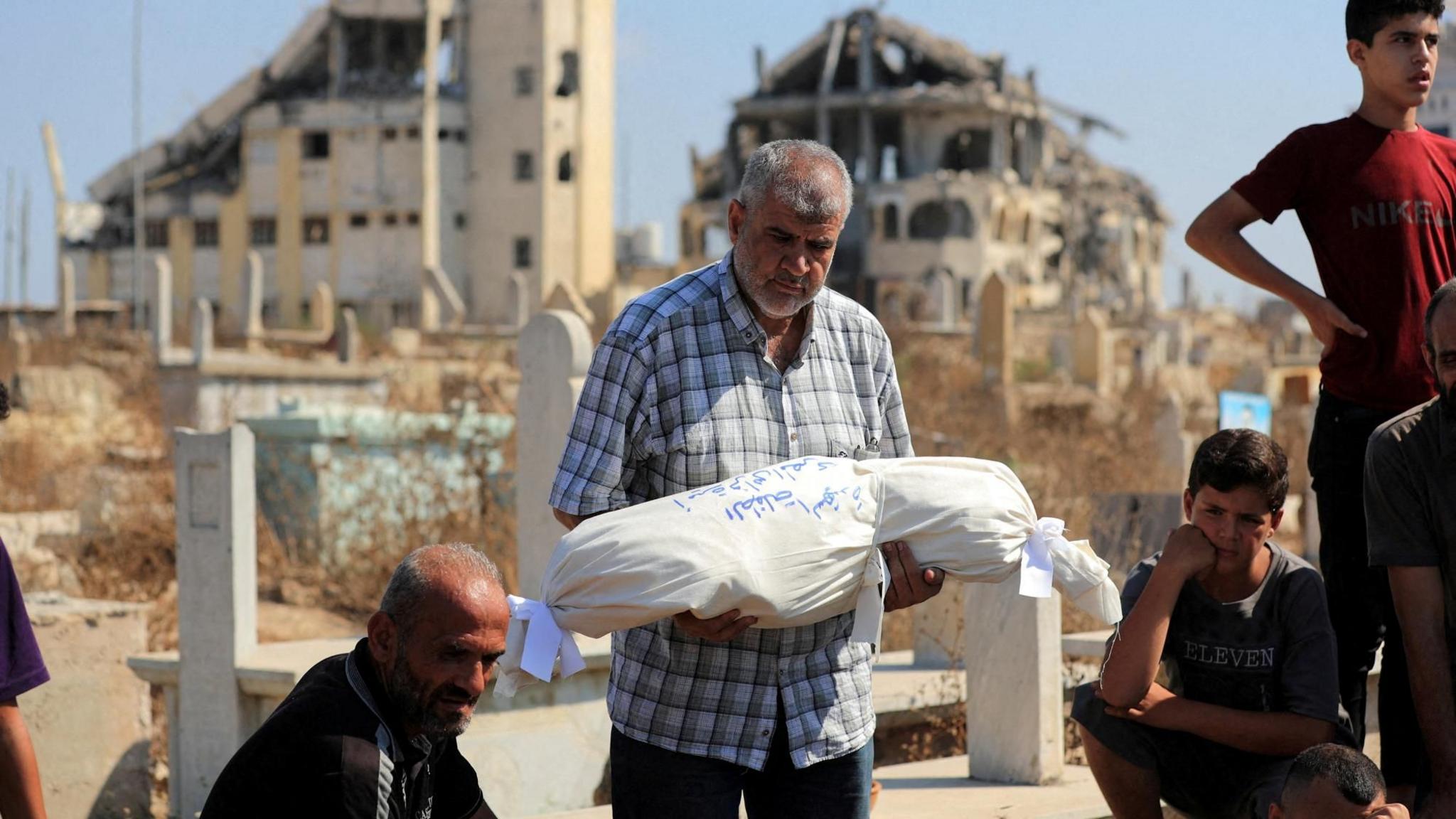 Twelve Palestinians Killed in Israeli Strikes, Including Six‑Member Family