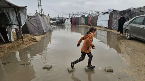 Facing Floods and Despair: Gazans Await Peace Amidst Humanitarian Crisis