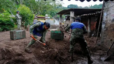 Devastating Floods in Mexico: Ongoing Search for Missing Persons