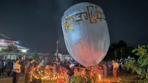 Tragedy Strikes Myanmar Buddhist Festival as Paraglider Bombs Crowd