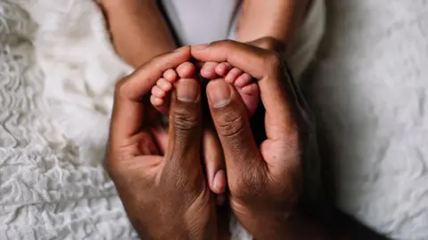 South Africa's Constitutional Court Grants Equal Parental Leave Rights to Fathers