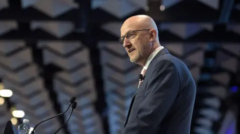 Warning from Australia's Spy Chief: Cyber Threats from China Rise