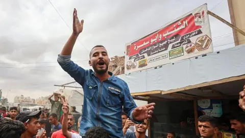 Palestinians Celebrate Ceasefire Deal Amidst Lingering Grief