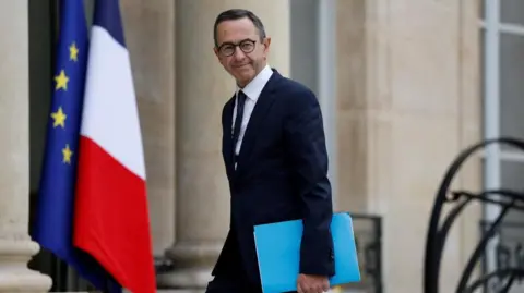France Steps Back from Migrant Boat Interception Pledge Amid Political Turmoil