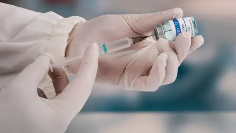 US Vaccine Panel Halts Recommendation for Covid-19 Vaccine in Adults