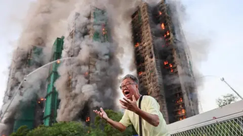 Tragic Fire Engulfs Hong Kong Apartment Towers, Leaving Four Dead