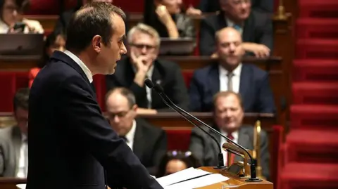 French Prime Minister Advocates for Suspension of Pension Reform Ahead of Crucial Confidence Votes