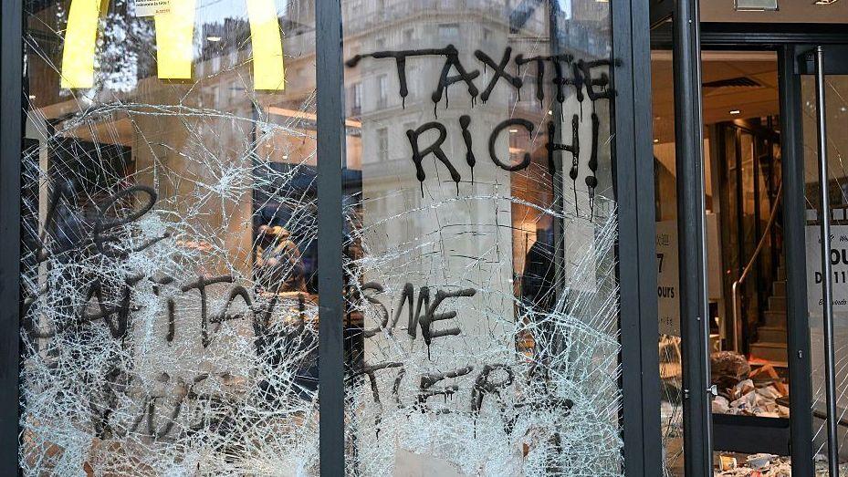 Vandalised shopfront in Paris after protests