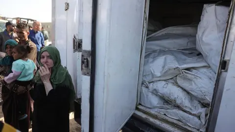 Forensic Team in Gaza Faces Harrowing Challenges as Bodies Reveal Possible Signs of Torture