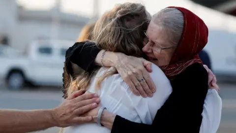 British Couple Freed From Taliban Detention: A Family's Joyful Reunion